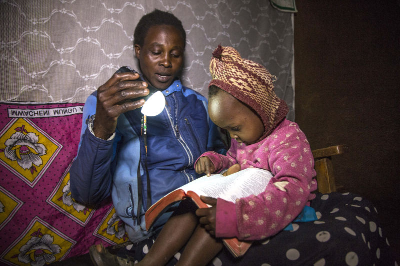 Leah Talam in Eldama Ravine, Kenya using M-KOPA product. Photo: M-KOPA Solar / Georgina Goodwin